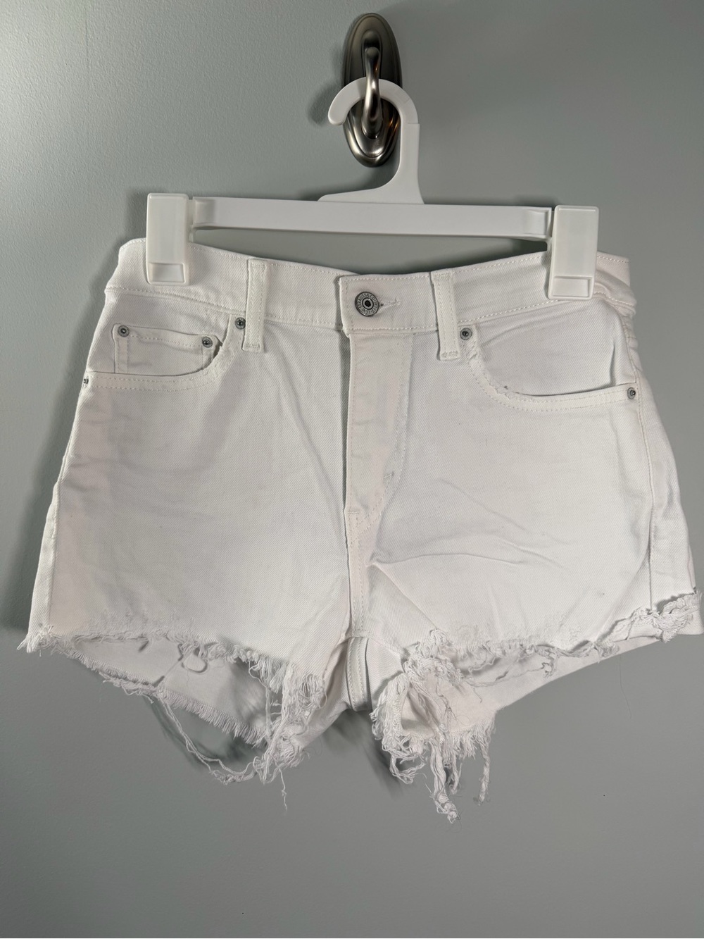 Levi High-Rise White Distressed Denim Shorts